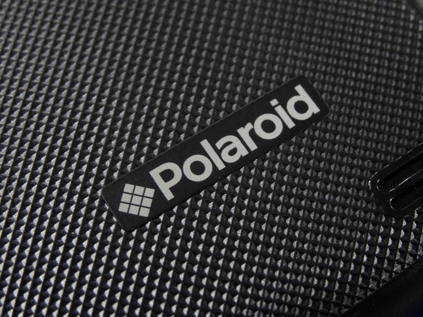 Polaroid pigu のPolaroidロゴ